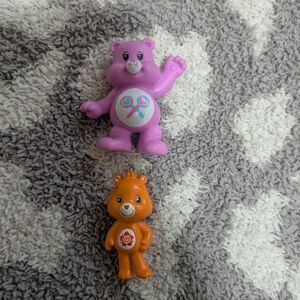 5/25$ Care Bears Purple and Orange Figures